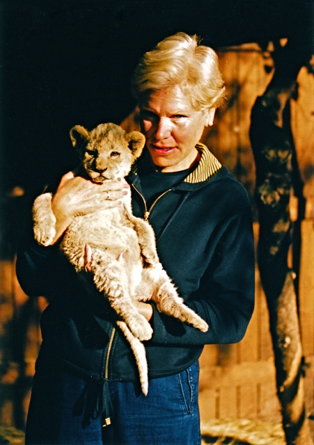 Heidi... is cuddling a two months old LION CUB in Sun City, South Africa